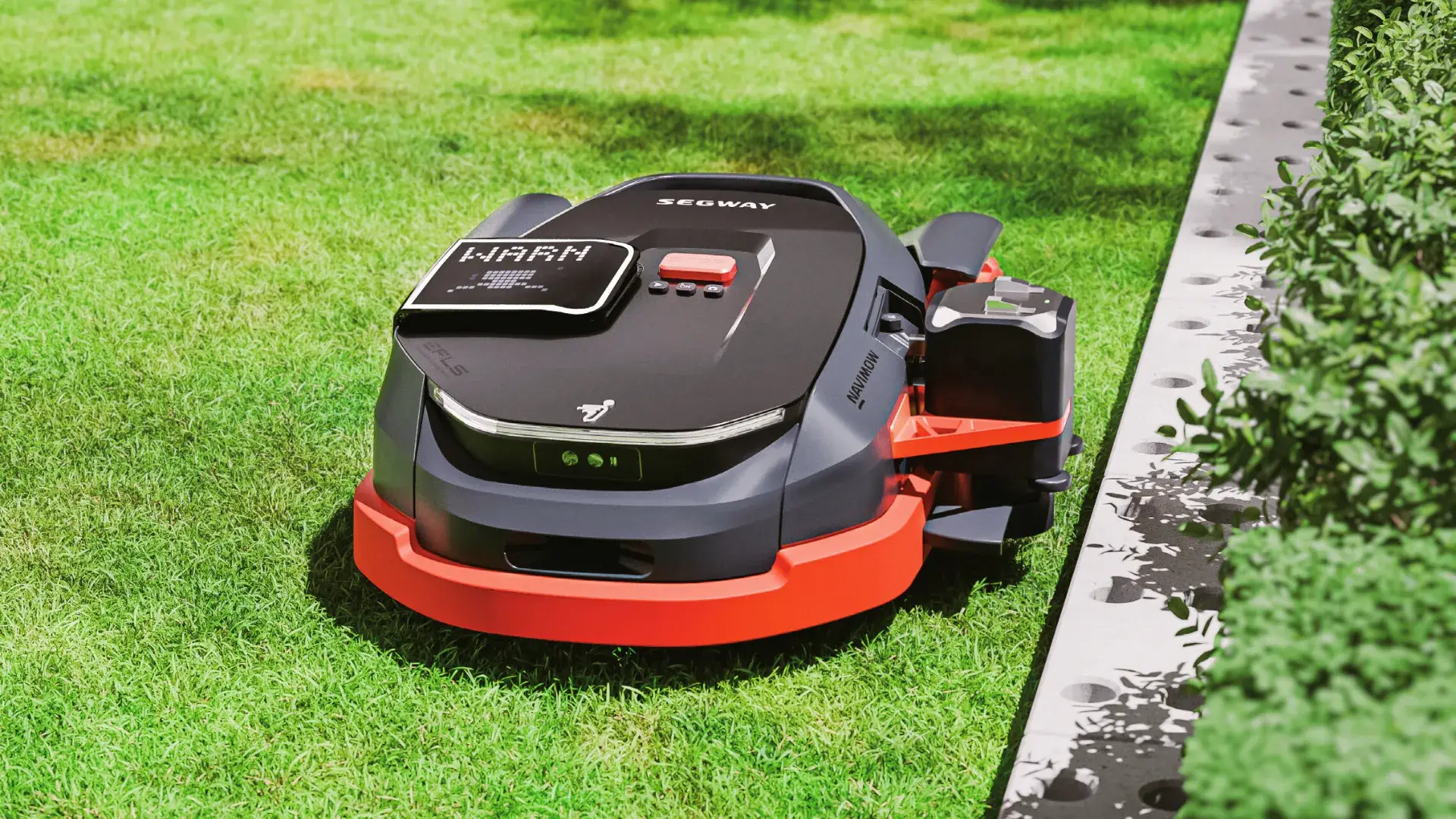 Segway Navimow X3 Series Mähroboter beim präzisen Rasenmähen entlang einer Kante im Garten.